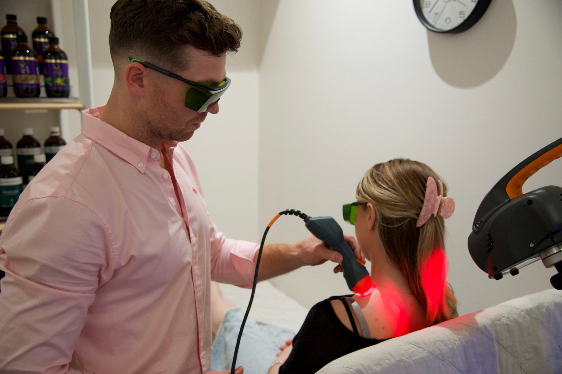 MLS laser therapy session targeting PCOS symptoms and chronic fatigue with advanced light healing technology