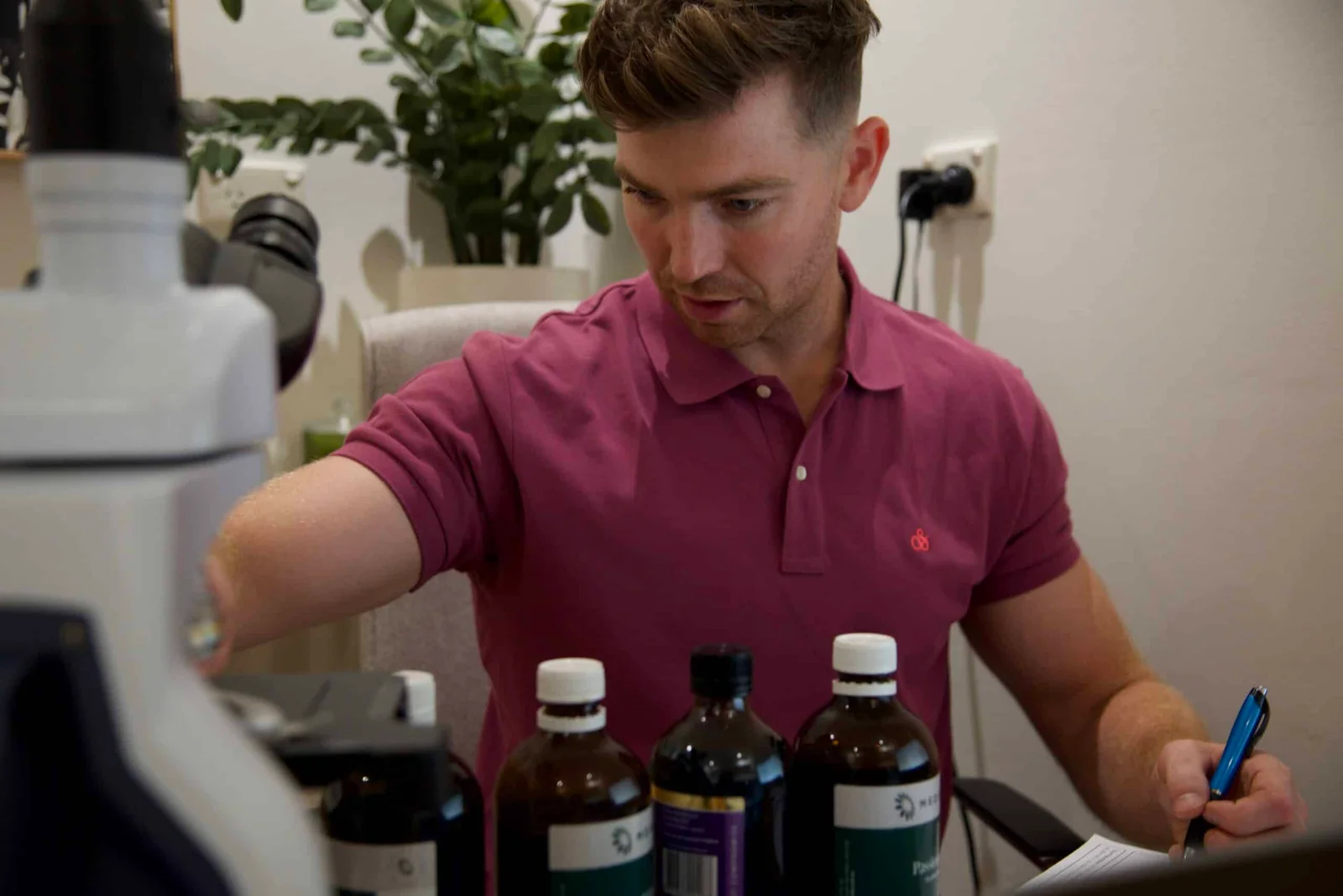 Naturopath analysing eczema causes through diagnostic testing at NXTLVL Health